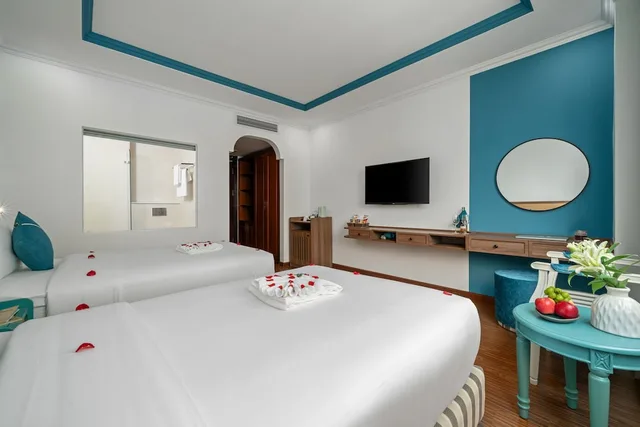 غرفة ديلوكس بسرير كينج بإطلالة جزئية على البحر، PARACEL DANANG HOTEL 2/6