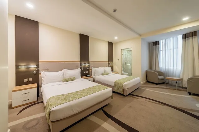 Superior, Triple, 1 Single and 2 Queen Beds، PrideInn Azure Hotel Nairobi Westlands 3/7