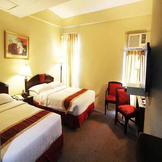 غرفة ديلوكس بسرير كينج، Sarrosa International Hotel And Residential Suites 2/2