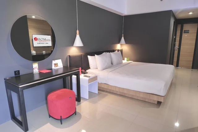 جناح جونيور بسرير مزدوج بشرفة، @Hom Hotel Simpang Lima 1/2