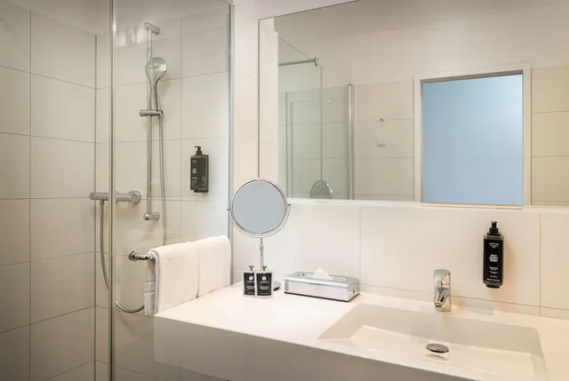 غرفة قياسية بسريرين منفصلين، elaya hotel leipzig city center 8/10