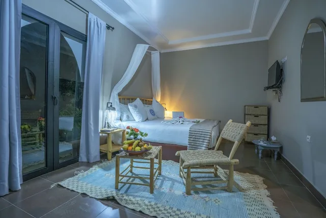غرفة بسرير كوين بإطلالة على الحديقة، Taj Atlas Wellness Boutique Hotel And Spa 3/4