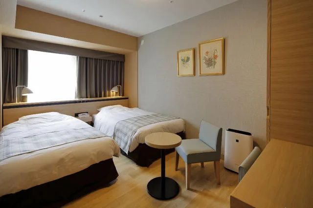 غرفة أساسية بسرير مزدوج أو سريرين منفصلين، Hotel Monte Hermana Fukuoka 1/1