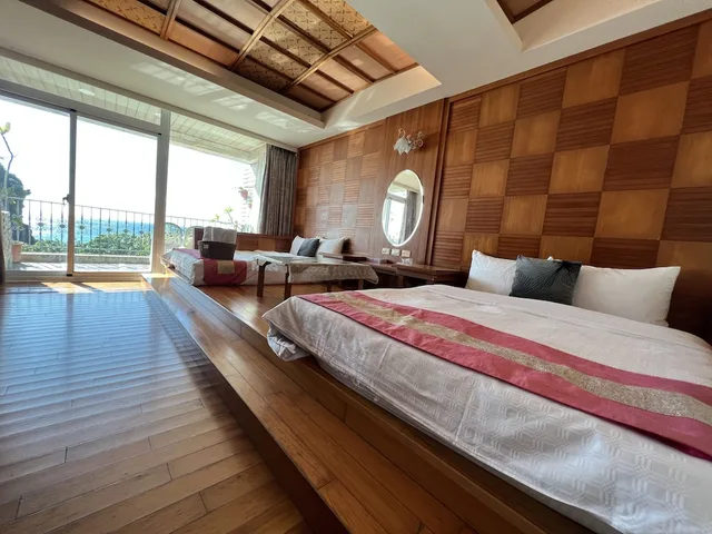 غرفة قياسية رباعية بسريرين مزدوجين بإطلالة على البحر، Ming-Jun Holiday Inn 1/10