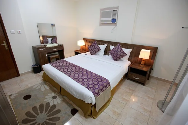 شقة بسرير مزدوج وسريرين منفصلين بغرفتي نوم، فندق برج العنوان(Enwan Suites Serviced Apartments) 3/10