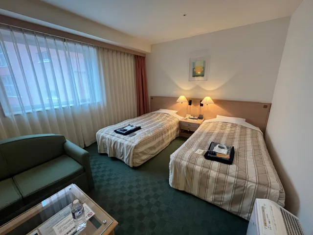 غرفة بسريرين منفصلين في الملحق، Jasmac Plaza Hotel 3/5