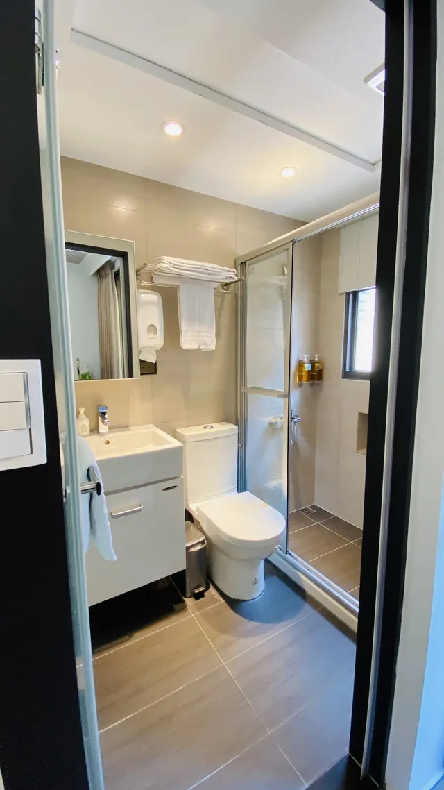 غرفة ديلوكس بسريرين منفصلين بغرفة نوم واحدة، Greenight Hotel 9/9