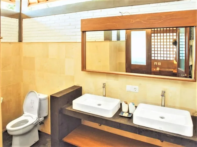 كوخ بسريرين منفصلين بإطلالة على البحر، Hi Blue Bali Melasti Resort by ZUZU 2/2