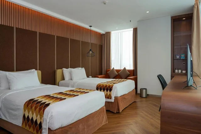 غرفة تنفيذية بسريرين منفصلين للمدخنين، Cambridge Hotel Medan (ex Grand Swiss Belhotel Medan) 1/4