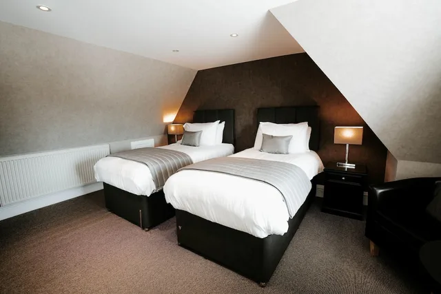 غرفة بسريرين منفصلين، New Inn Hotel 1/1
