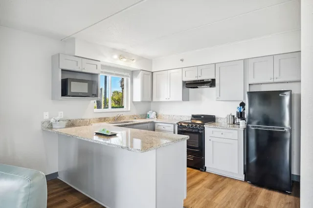 Walkout, Premier, Suite, 2 Queen Beds, Beach Front, Kitchen، Sugar Sands Inn And Suites Panama City Beach 7/9