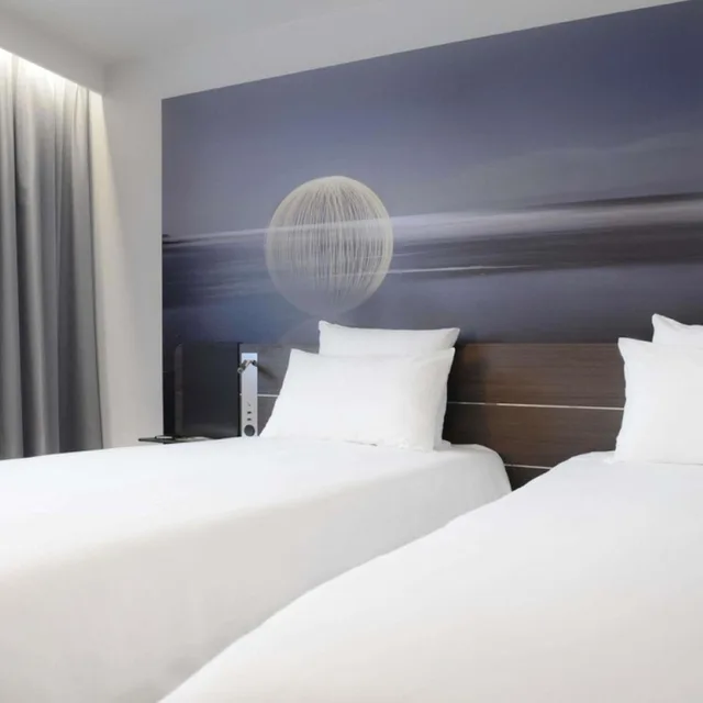 غرفة عائلية بسرير مزدوج وسرير فردي مع أريكة، Novotel Valence Sud 5/7