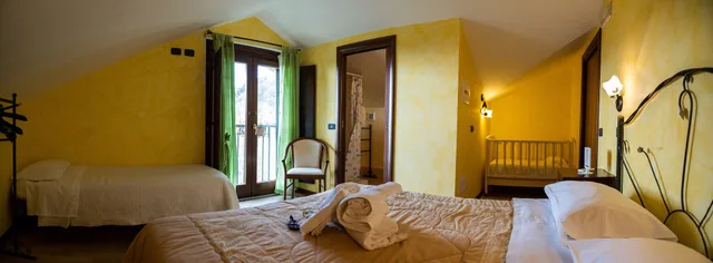 غرفة ثلاثية بسرير كوين وسرير فردي بإطلالة على البحر، Agriturismo San Basilio 2/10