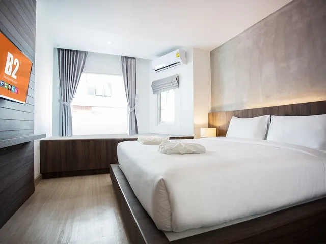 غرفة فاخرة ثلاثية بسرير مزدوج وسرير فردي، B2 Hat Yai Premier Hotel 1/8