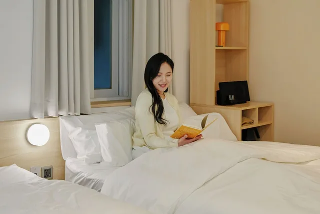 غرفة قياسية ثلاثية بسرير مزدوج وسرير فردي، Myeongdong Guesthouse Como 6/9