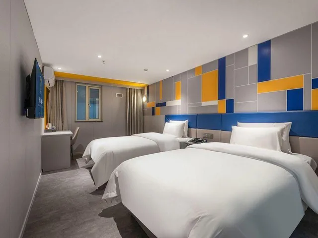 غرفة ديلوكس بسريرين منفصلين، 7 Days Inn Guangzhou Shahe Clothes City 1/1