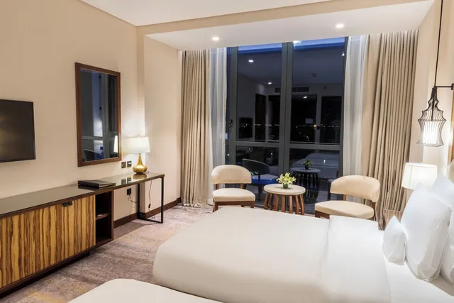 غرفة بريميير بسريرين منفصلين بإطلالة على المسبح بشرفة، Millennium Resort Salalah 4/6