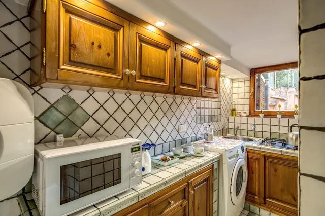 شقة بسرير مزدوج وسرير فردي بشرفة بغرفة نوم واحدة مع أريكة، Tritone Top House 5/10