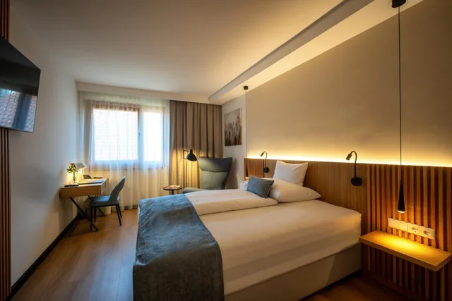 غرفة بسرير كوين، VILA VITA Pannonia 1/5