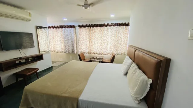غرفة كومفورت بسرير فردي، Amaravathi Hotel 5/8