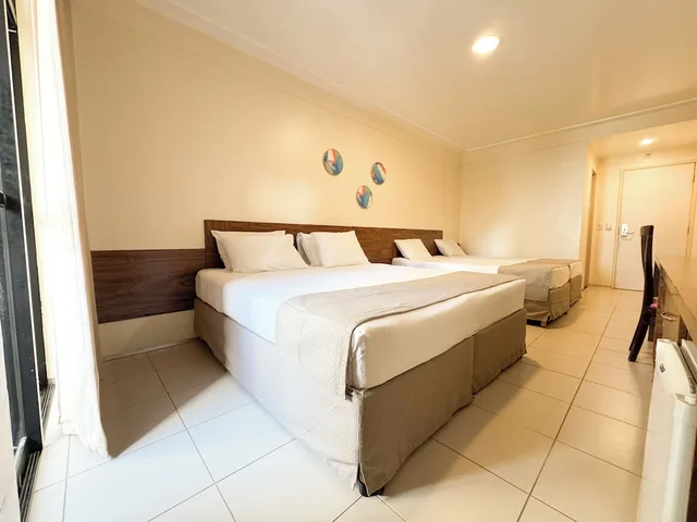 غرفة قياسية رباعية بسرير كوين وسريرين منفصلين، D8 Hotel Express 4/10
