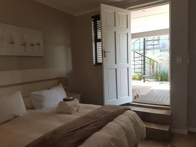 غرفة قياسية بسرير كوين بغرفة نوم واحدة، Melkbosch Guesthouse 1/3