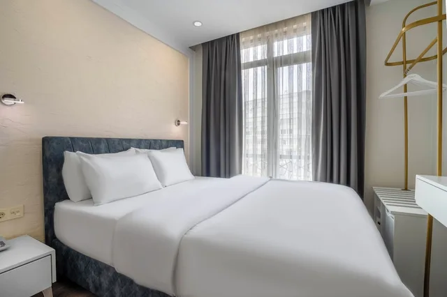 غرفة عائلية رباعية بسرير كوين وسريرين منفصلين، Actuel Life Hotel 4/9