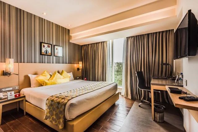 غرفة ديلوكس بسرير فردي، Landmark Residency 1/5