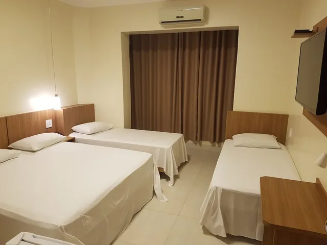 غرفة قياسية رباعية بسرير كوين وسريرين منفصلين، Oft Place Hotel 1/2