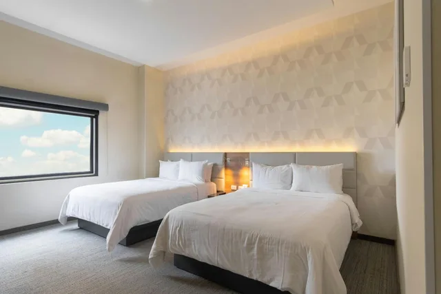 غرفة قياسية بسريرين كوين، SJ Grand Hotel Monterrey 2/3
