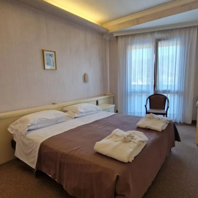 غرفة بسرير مزدوج أو سريرين منفصلين، Hotel Terme Marconi 1/7