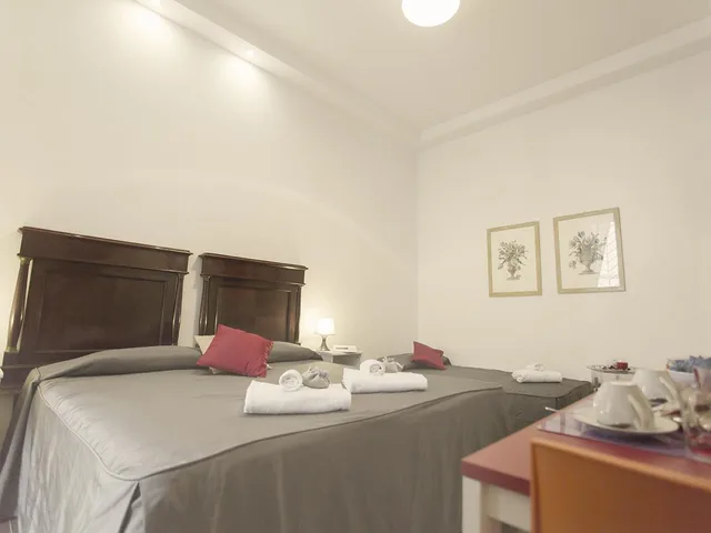 غرفة ثلاثية، Maison Colosseo 2/2