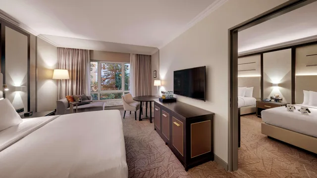 غرفة متصلة عائلية بسرير مزدوج، Hilton Munich City 1/3