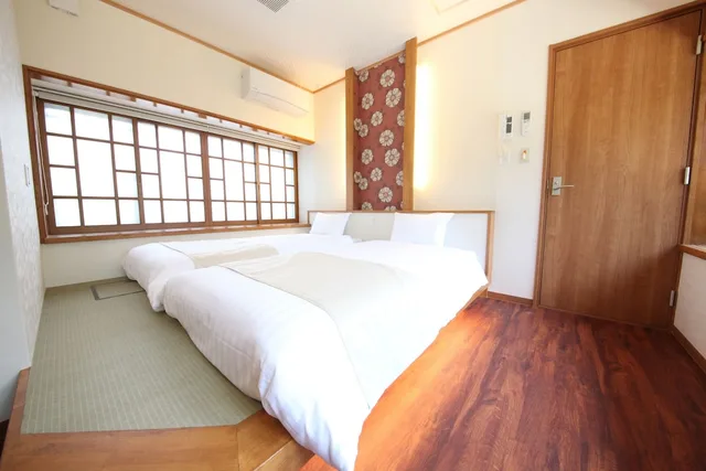 غرفة بسريرين منفصلين بإطلالة على الحديقة، Ichinomatsu Japanese Modern Hotel 4/4