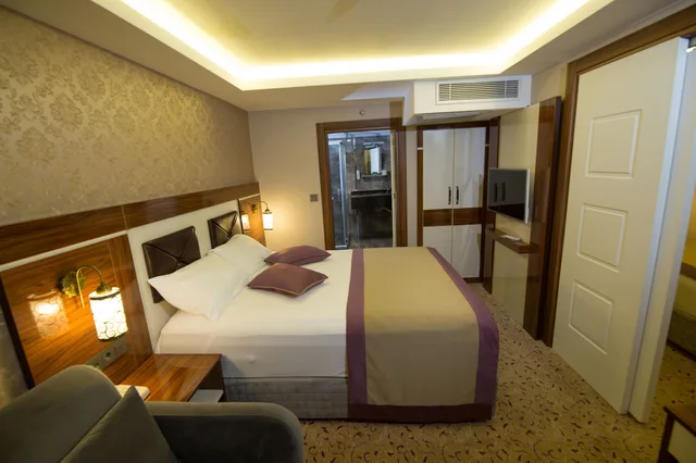 جناح عائلي بسريرين منفصلين مع أريكة، Huzur Thermal Hotel 1/3