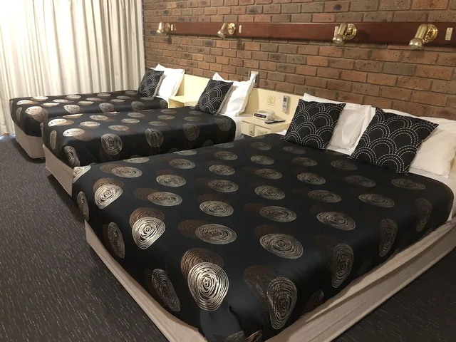 غرفة ديلوكس عائلية بسرير كوين وسريرين منفصلين، Best Western Travellers Rest Motor Inn 1/2