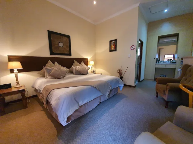 غرفة ديلوكس بسرير مزدوج، Mannah Guest Lodge 1/4