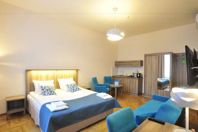 شقة بسرير كينج بحمام خاص مع أريكة، Kosmopolita Rooms Apartments Krakow 1/10