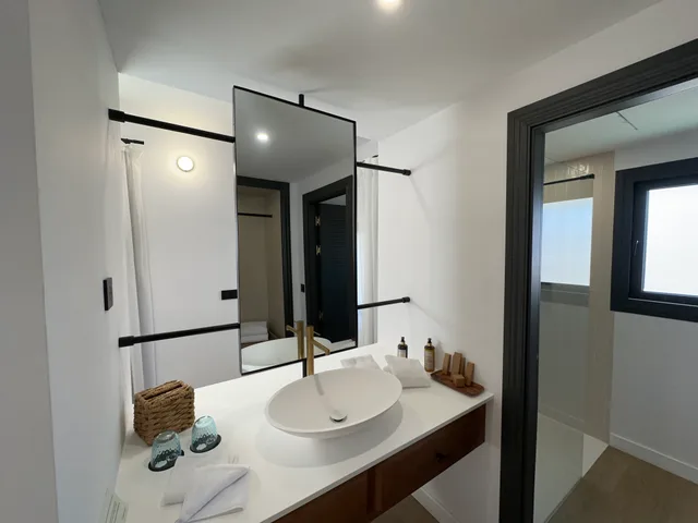 جناح جونيور، THE SUITES AT SAN ROQUE CLUB 2/3