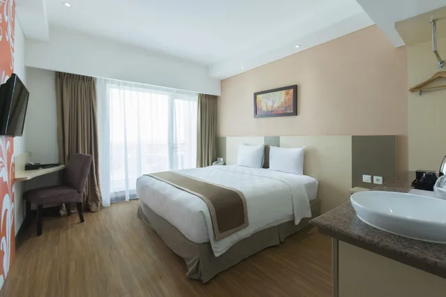 غرفة سوبيريور بسرير كينج، Dalton Hotel 2/2