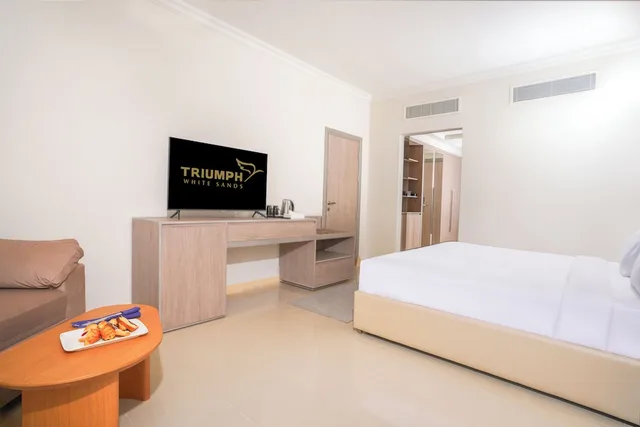 Deluxe, King Bed, Side Sea View، Triumph White Sands 4/4