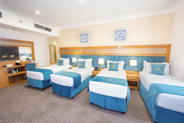غرفة قياسية رباعية بإطلالة على المدينة، توليب إن الدار(Tulip Inn Al Dar Rawafed) 3/8