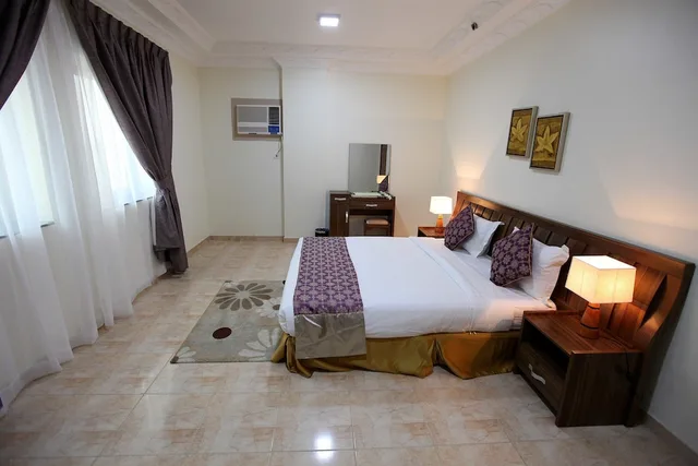 شقة بسرير مزدوج وسريرين منفصلين بغرفتي نوم، فندق برج العنوان(Enwan Suites Serviced Apartments) 1/10