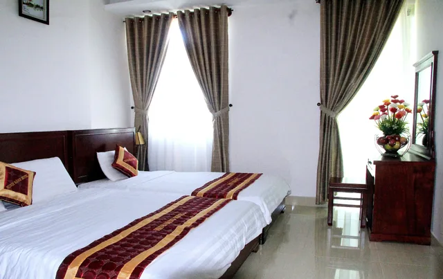 غرفة ديلوكس رباعية بسريرين كوين، Minh Dang Hotel 6/9