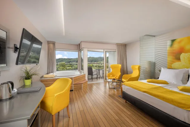 غرفة بريميوم بسرير مزدوج مع أريكة، Wellness Hotel Villa Magdalena 1/2