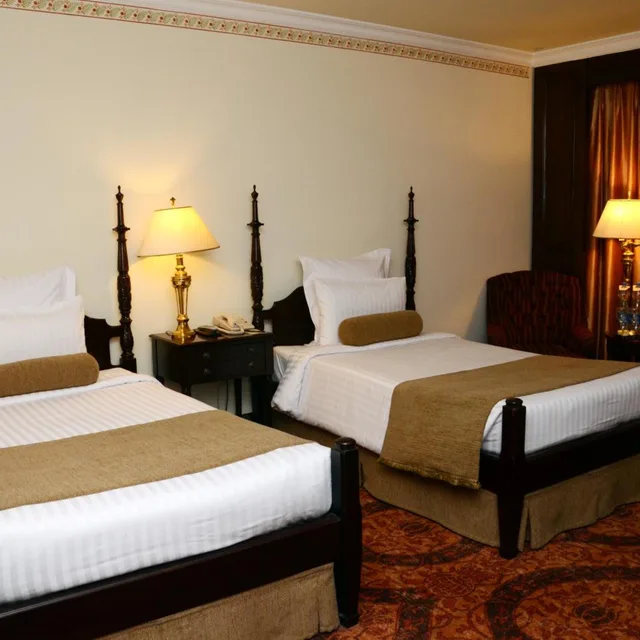 غرفة ديلوكس بسريرين منفصلين، Pearl Continental Hotel Lahore 1/8
