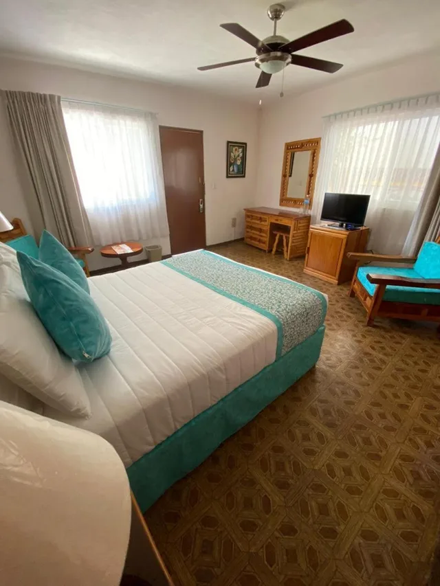 غرفة قياسية بسرير كينج، Hotel Quinta las Flores 1/4