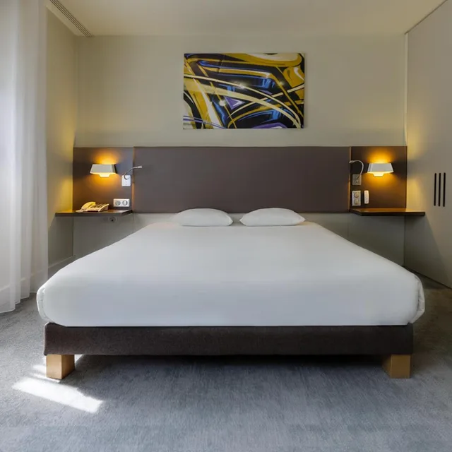 غرفة قياسية بسرير مزدوج مع أريكة لذوي الإعاقة، Novotel Suites Paris Stade De France 1/4