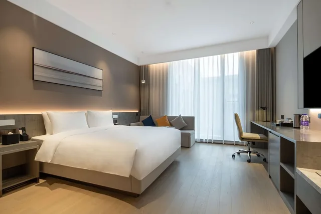 غرفة بسرير كينج مع أريكة، Huidong Business Hotel 2/4