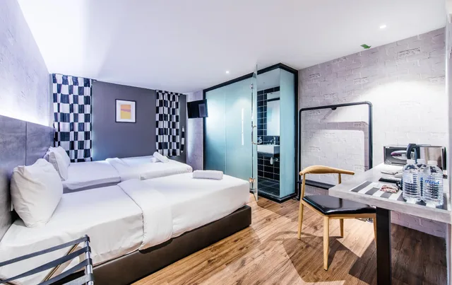 غرفة اقتصادية عائلية بسرير كوين وسرير فردي، Stella Hotel 1/2